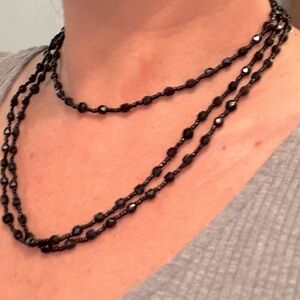 Long black beaded necklace